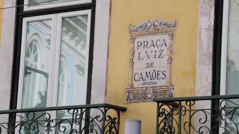 street sign of praca luis de camoes in the center of lisbon, portugal.