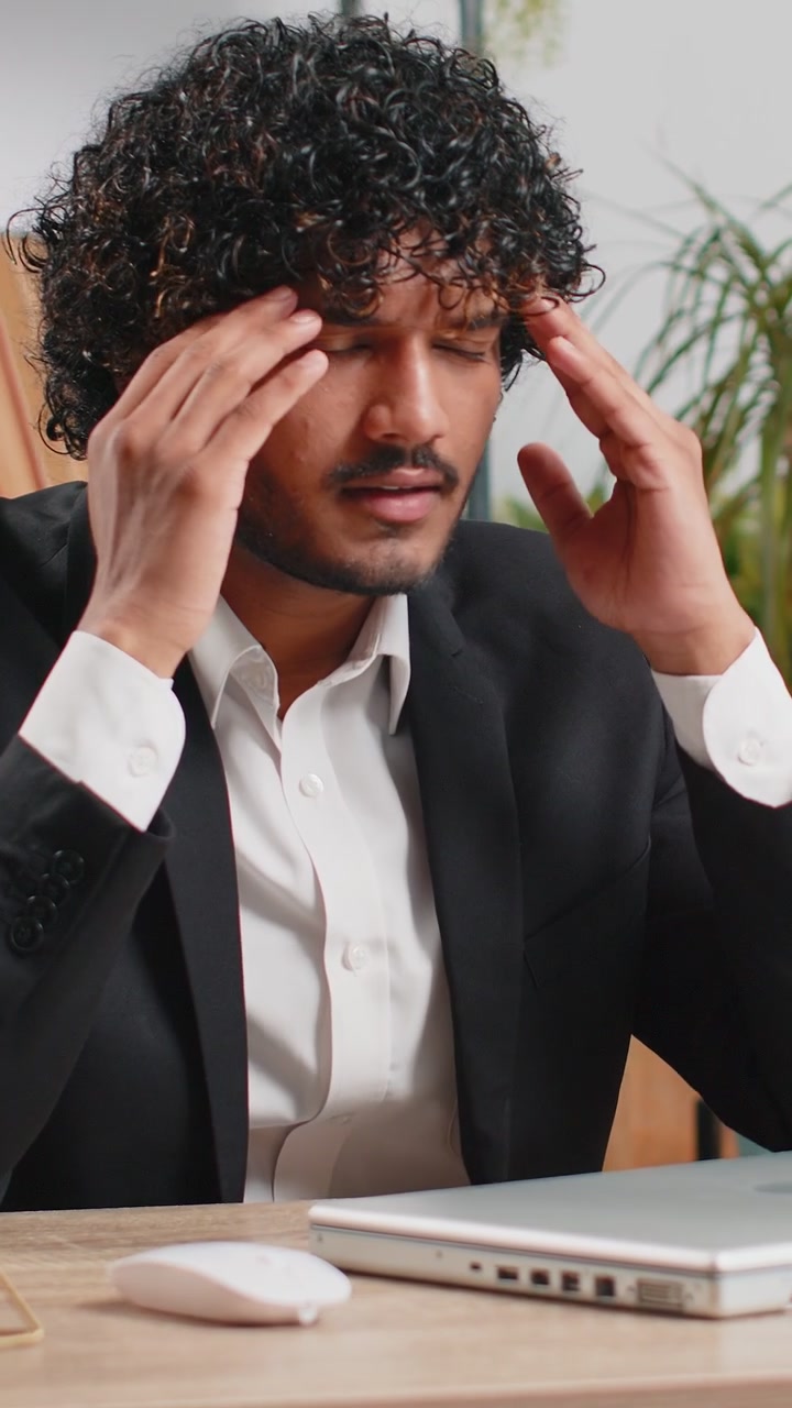 Irritated tired businessman working on laptop website problem computer virus data loss by hacking