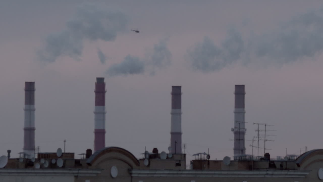 Smoking chimneys and a helicopter
