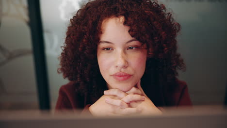 young woman working at her computer
