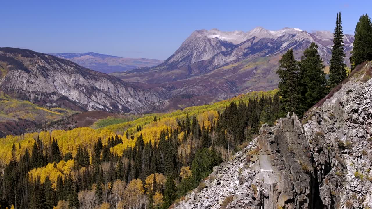 Aerial views of Colorado's Ragged and Marcelina mountain range during the vibrant colorful fall season
