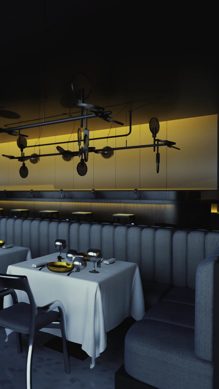 Dining area in a restaurant with minimal decor and soft lighting at night