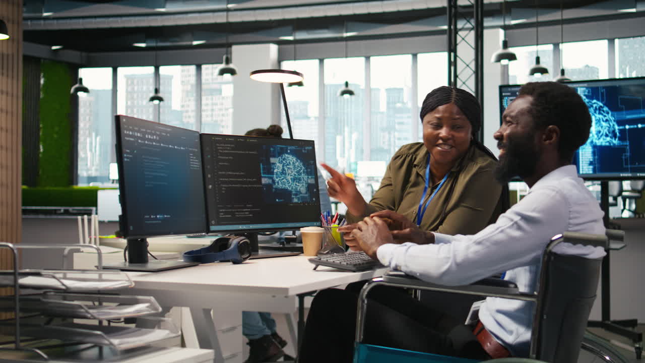 Cheerful Manager And Employee With Paraplegia In Inclusive Workplace