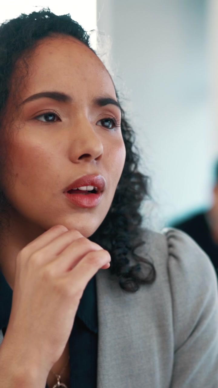 Stressed Businesswoman Rubbing Her Eyes in Office
