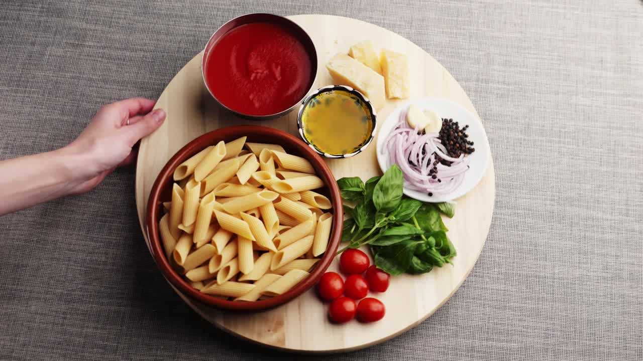 Preparing Pasta with Tomato Sauce