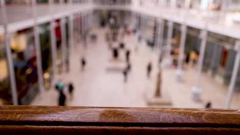 people walking inside the museum atrium