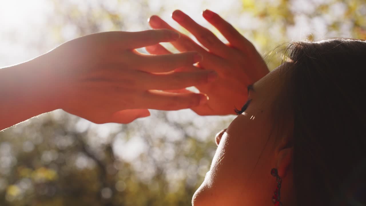 A Serene Moment in Nature: Captured Through Glowing Sunlight, Tender Touches, and Gentle Expressions That Illustrate Connection and Tranquility