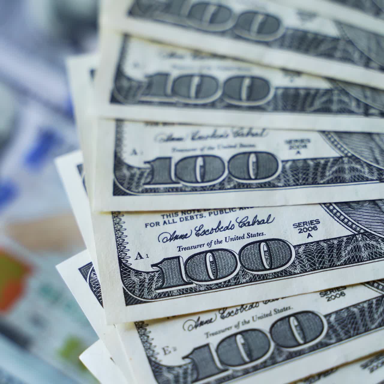 Cash money background. Rotation paper money. American one hundred dollar paper banknotes spinning slowly. Rich background with 100 dollar bills.