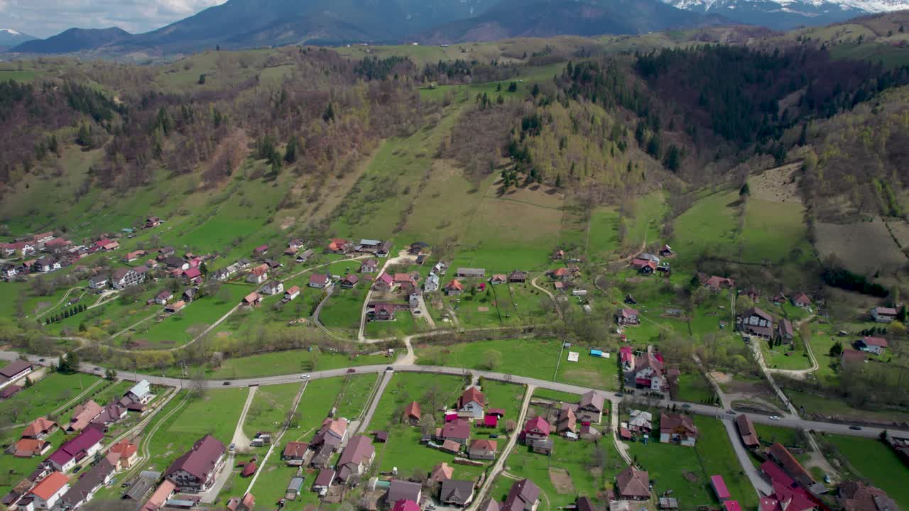 Unveiling the Hidden Charms of Bucegi Mountains- A Spectacular Display of a Quaint Mountain Village and Luxuriant Greenery Against the Majestic Backdrop of Romania's Picturesque Mountain Range