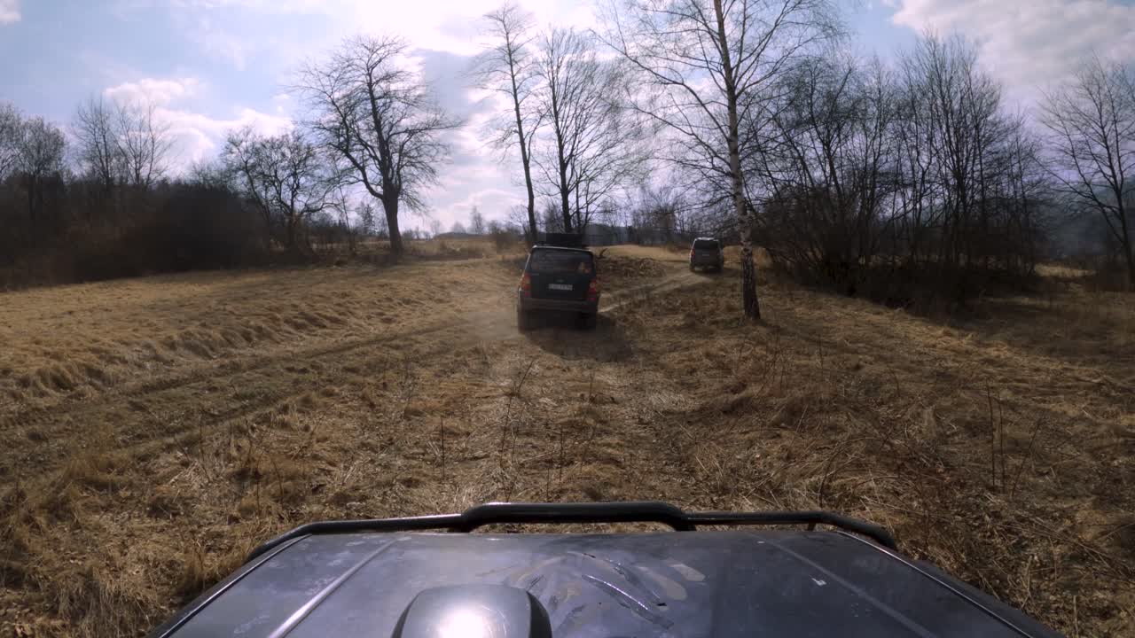 Off-road 4x4 vehicles driving on gravel dust roads - GoPro 4k window pov