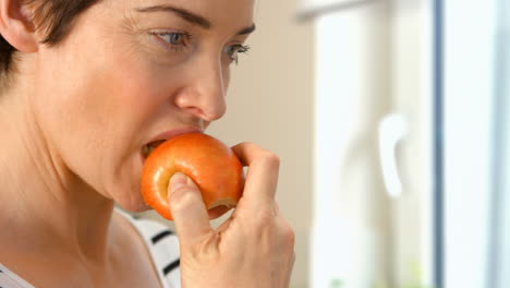 woman eating an apple