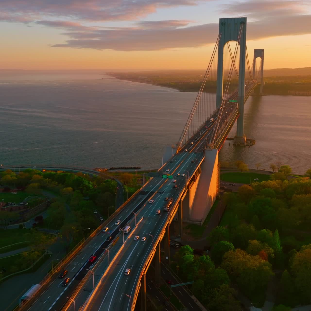 Highways leading to the big beautiful bridge. Stunning view of Bronx Whitestone bridge over magnificent river