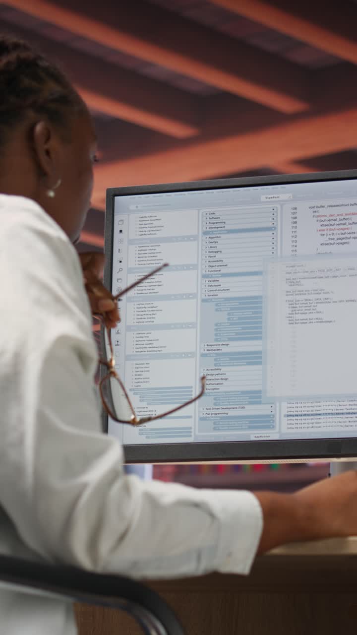 Vertical video Irked software developer frustrated while coding, struggling to do optimizations