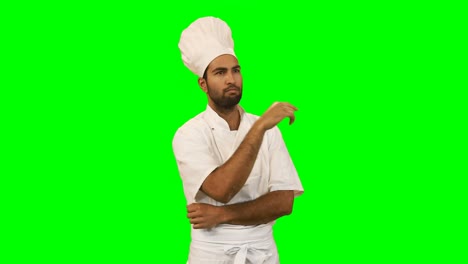 el chef tocando la pantalla invisible