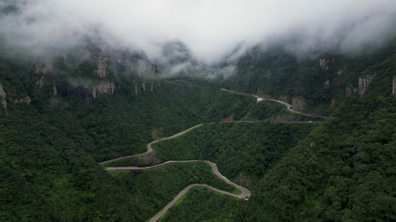 Reverse Dolly aerial view of Serra di Rio do Rastro during a foggy day - Santa Catarina, Brazil