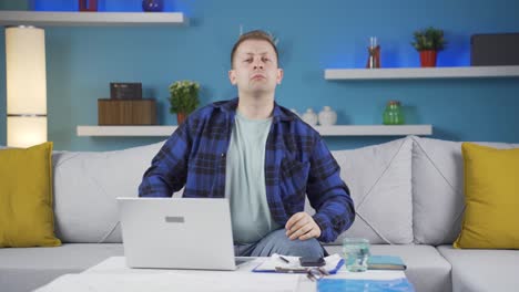 home office worker man looking at camera curious and confused.