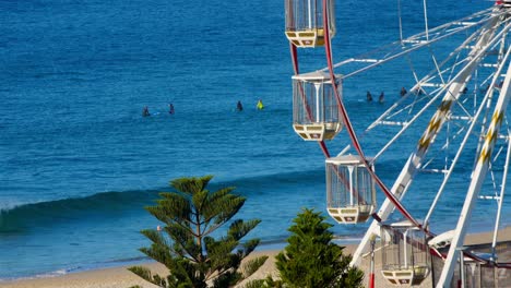 ferris wheel on blue sea background