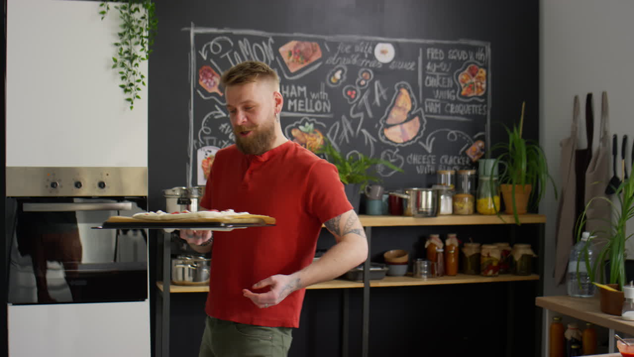 Food Blogger Putting Pizza in Oven