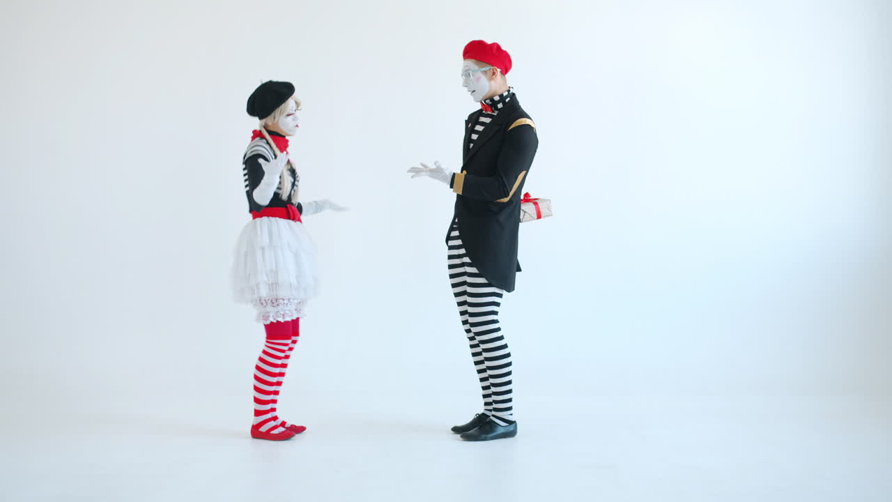 Mime Couple Exchanging a Gift