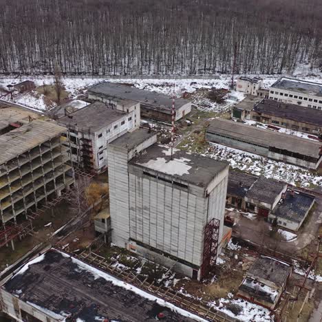 damaged industrial plant. old factory with abandoned buildings. desolate place after the military actions. view from above