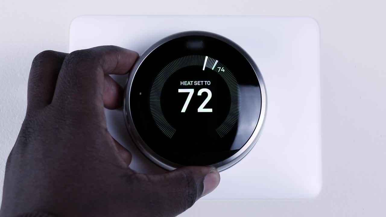 Adjusting the room temperature using a smart thermostat