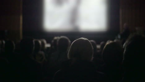 people watching film in the cinema