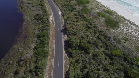 Scenic-Gardens-Road-Winding-Through-Sloop-Lagoon-And-Taylors-Beach-In-Tasmania