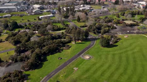 beautiful aerial scenic view from kuirau park to lakefront and rotorua city centre during sunny day, new zealand