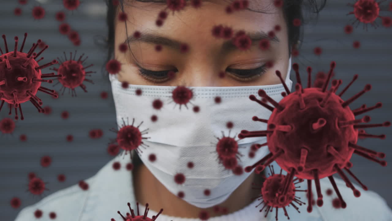 Animation of covid cells floating over portrait of woman wearing face mask in city street