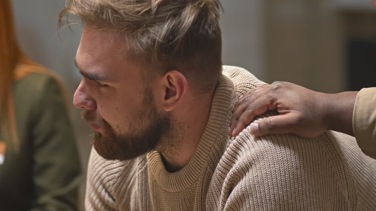 Emotional Man with Depression at Therapy Session