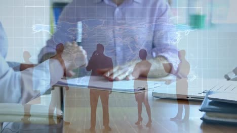 Businessmen-signing-documents-and-shaking-hands-with-connected-people-icons-in-the-foreground