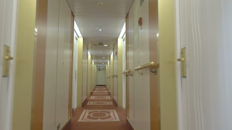 moving in hotel corridor with light interior