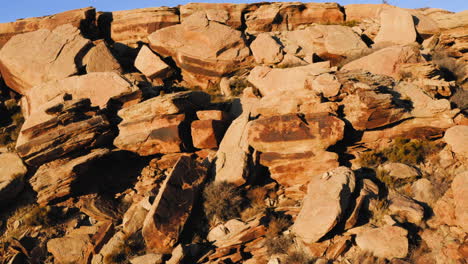 Petrified-colorful-rocks-of-painted-desert-in-sunlight-at-Arizona