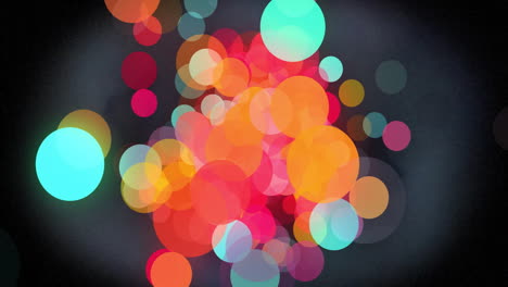 animating colorful bokeh lights over dark background