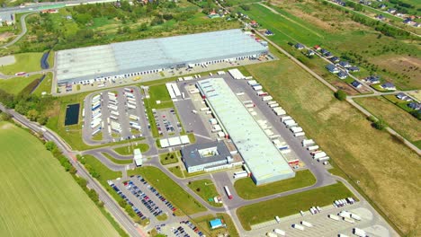 aerial view of warehouse storages or industrial factory or logistics center from above