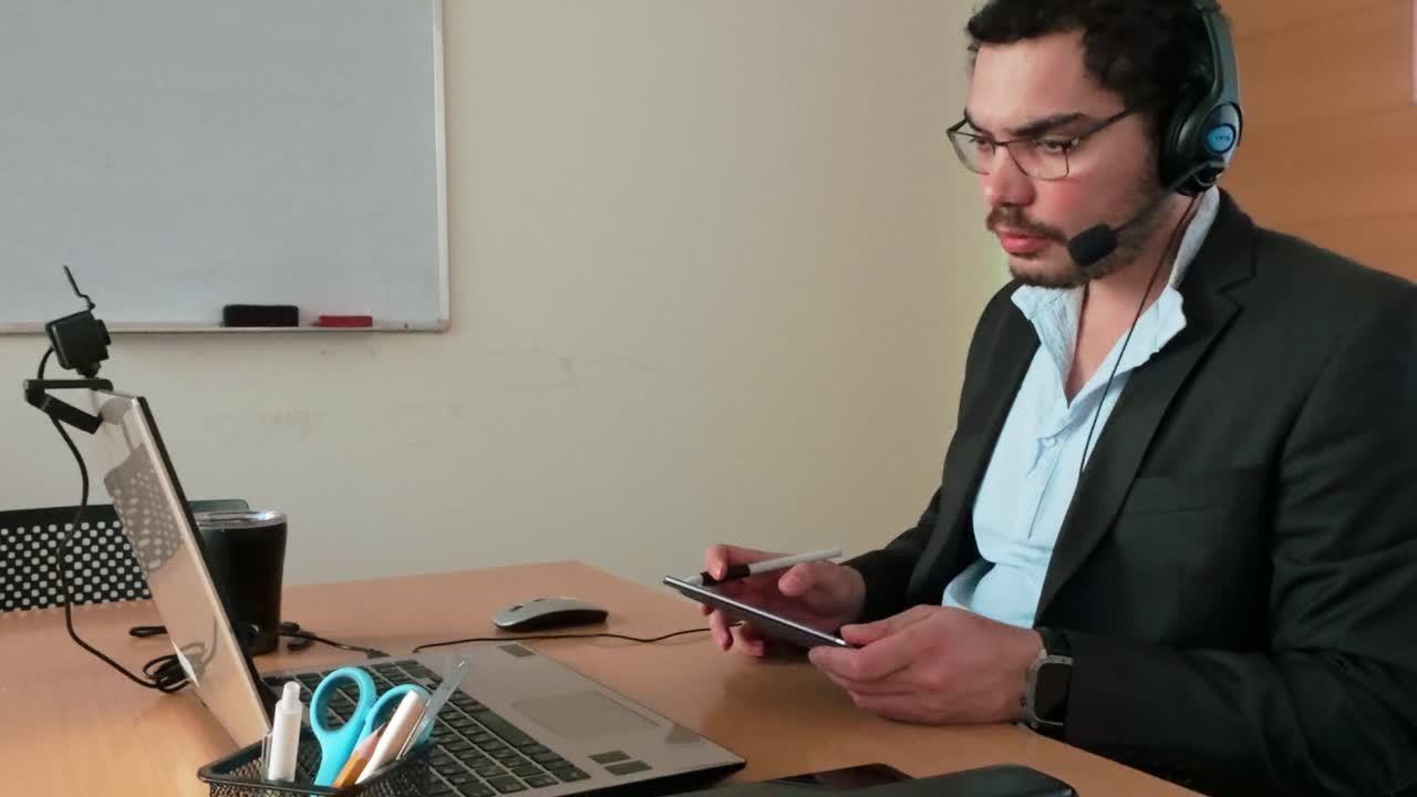 Online Workshop: Man Using Tablet for Notes