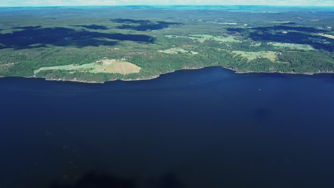 Breathtaking aerial view of Norway's scenic coastline and lush landscapes