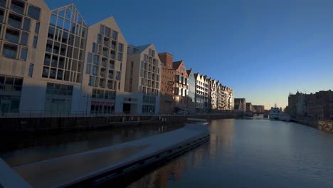 riverside cityscape of gdansk poland, day shot establishment city shot