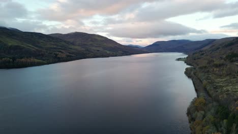 Beautiful-autumn-sunrise-at-Loch-Earn,-Scotland--Aerial-view