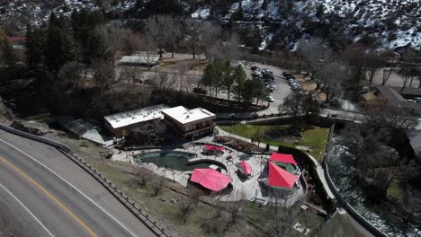 Lava-Hot-Springs-Foundation-World-Famous,-Idaho-USA,-Drone-Aerial-View-of-Facility-by-US-30-Route