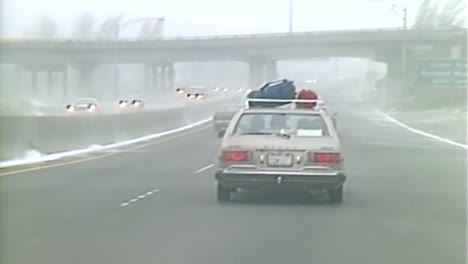 winter weather driving on highway in 1983