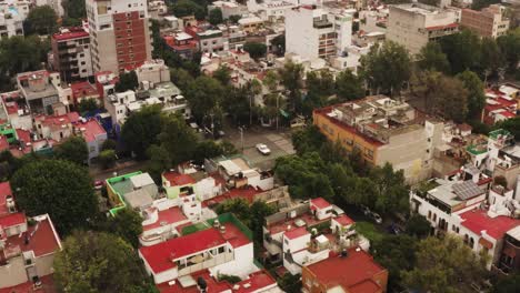 apartment buildings and streets of mexico city suburbs, aerial drone view