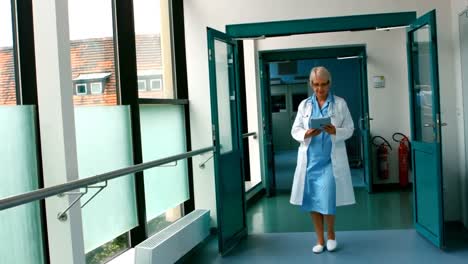 female doctor using digital tablet