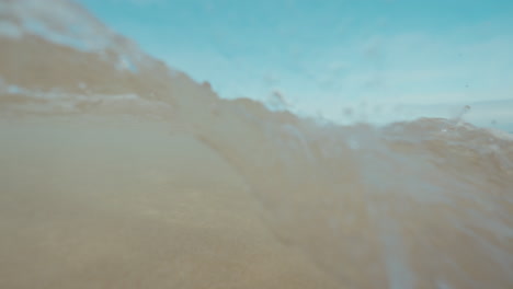 person running in shallow water