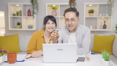 couple holding bitcoin.