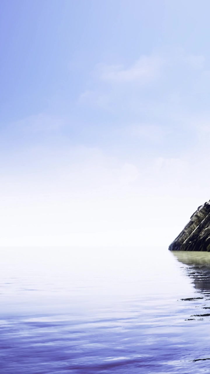 Calm water meets the shore of a rocky landscape at sunrise along the coastline