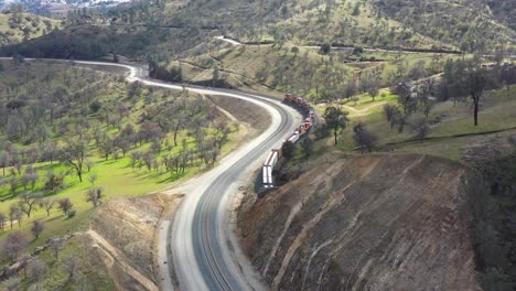 drone bnsf train coming out a tunnel at the tehachapi loop tunnel