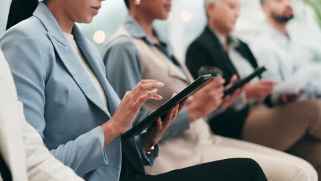 Conference,-hands-and-audience-on-tablet