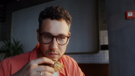 man eating at a restaurant