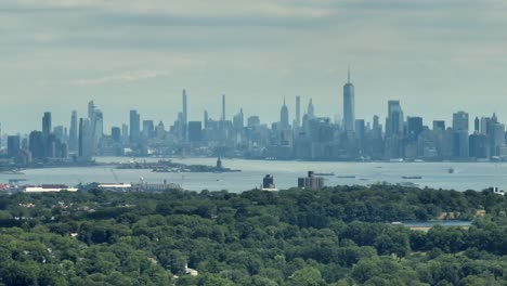 aerial view of staten island greenbelt a public parkland and skyline of new york city, usa